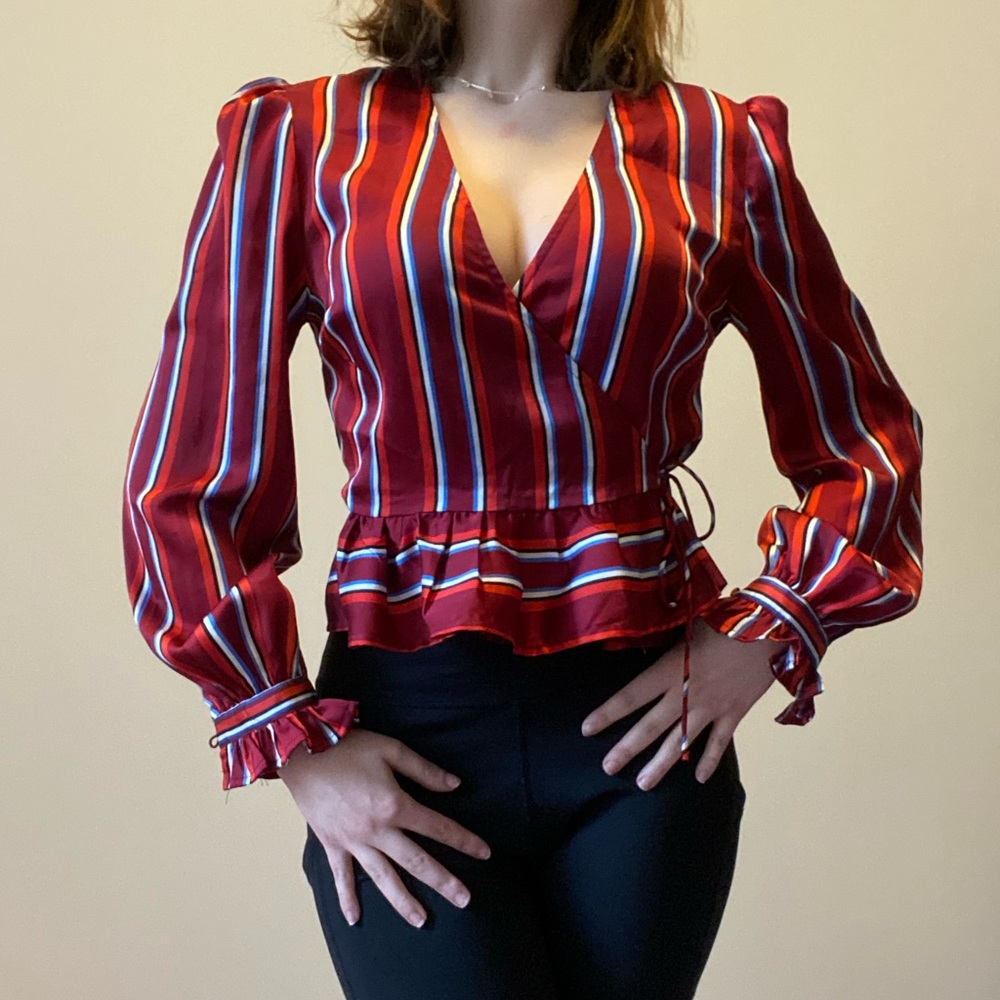 THE FIFTH LABEL STRIPPED “SILKY” PEPLUM BLOUSE
